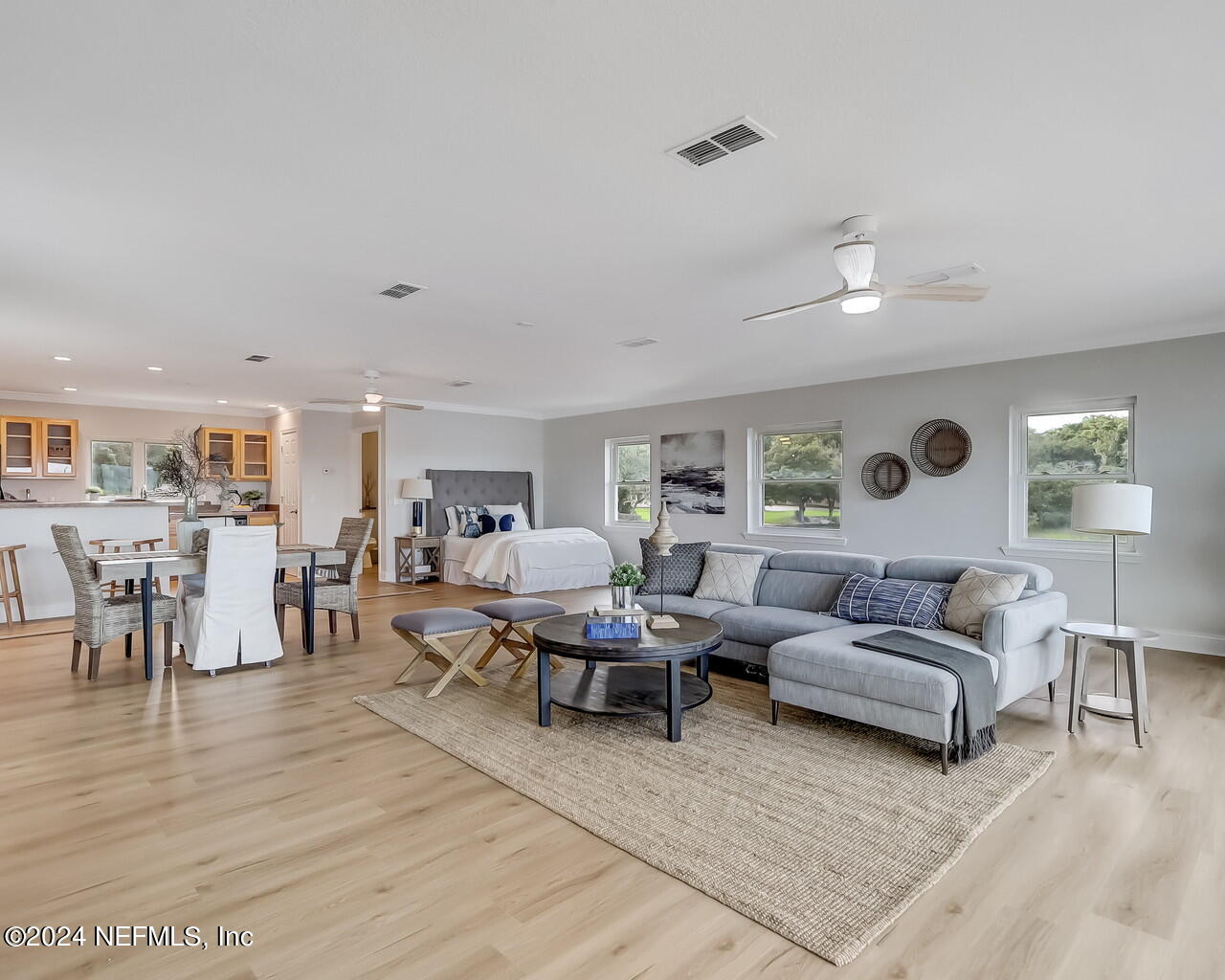 14192 Tomas Point Lane Jacksonville, FL 32225 - Photo 152 of 172 a living room with furniture and a wooden floor