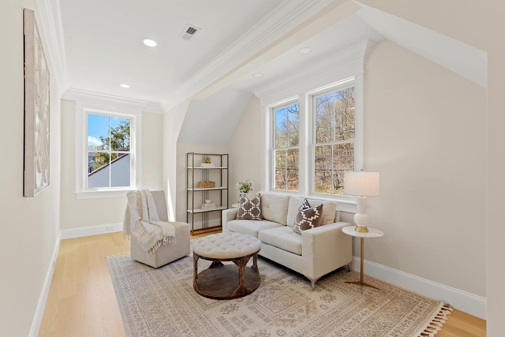 320 Concord Avenue Lexington, MA 02421 - Photo 24 of 40 a living room with furniture and a large window