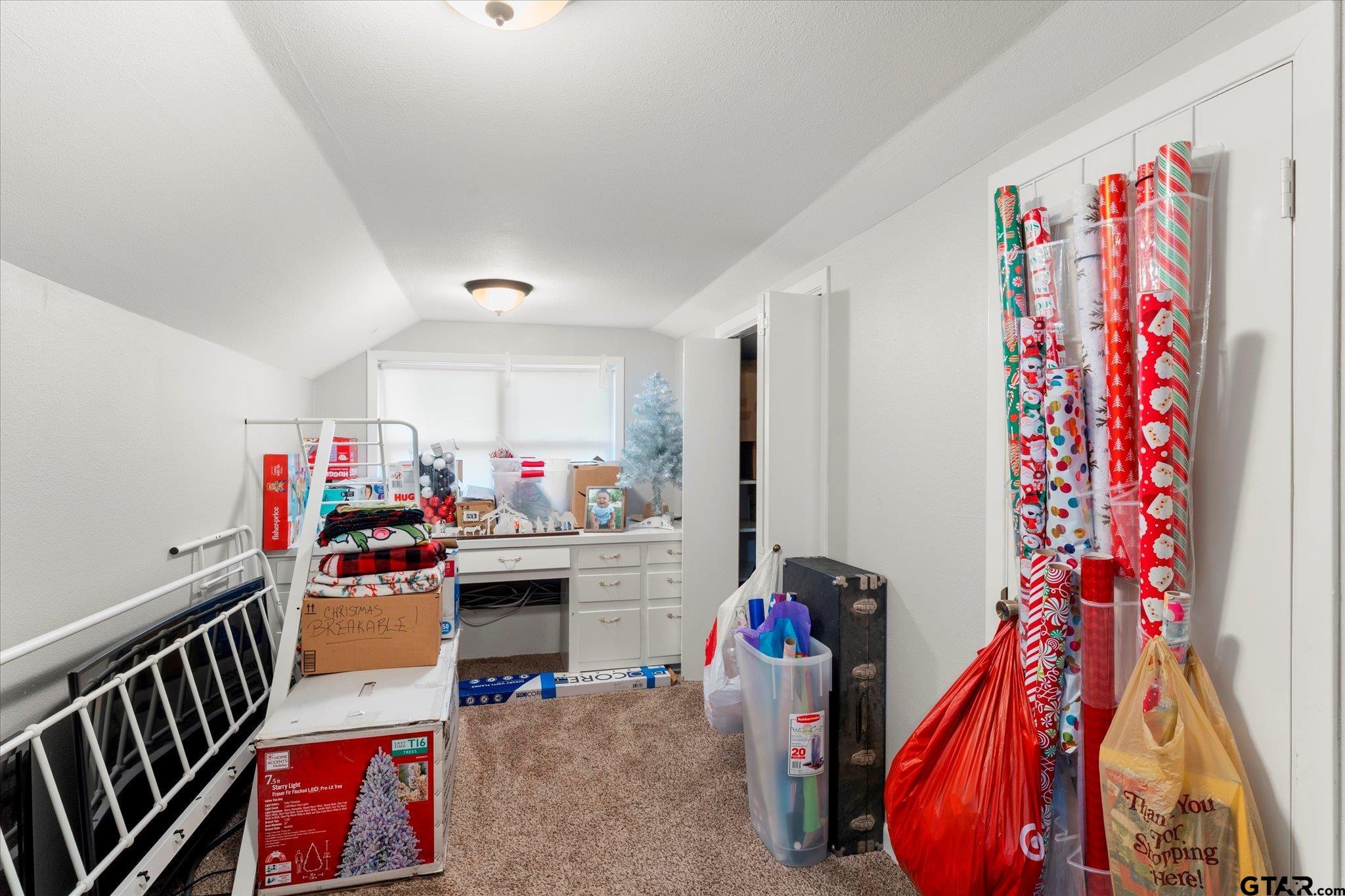 337 Daingerfield Street Pittsburg, TX 75686 - Photo 34 of 40 a living room with furniture and a potted plant