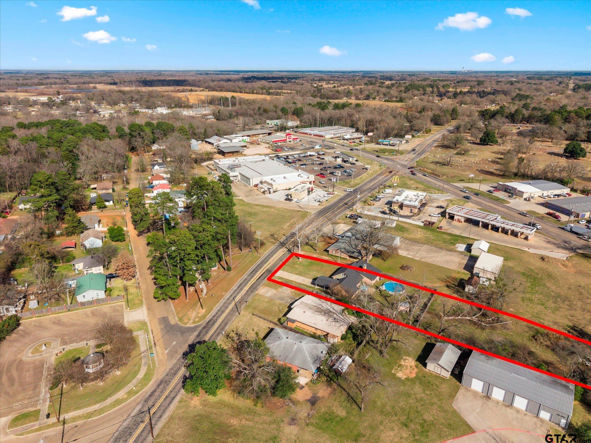 337 Daingerfield Street Pittsburg, TX 75686 - Photo 39 of 40 an aerial view of residential houses with outdoor space