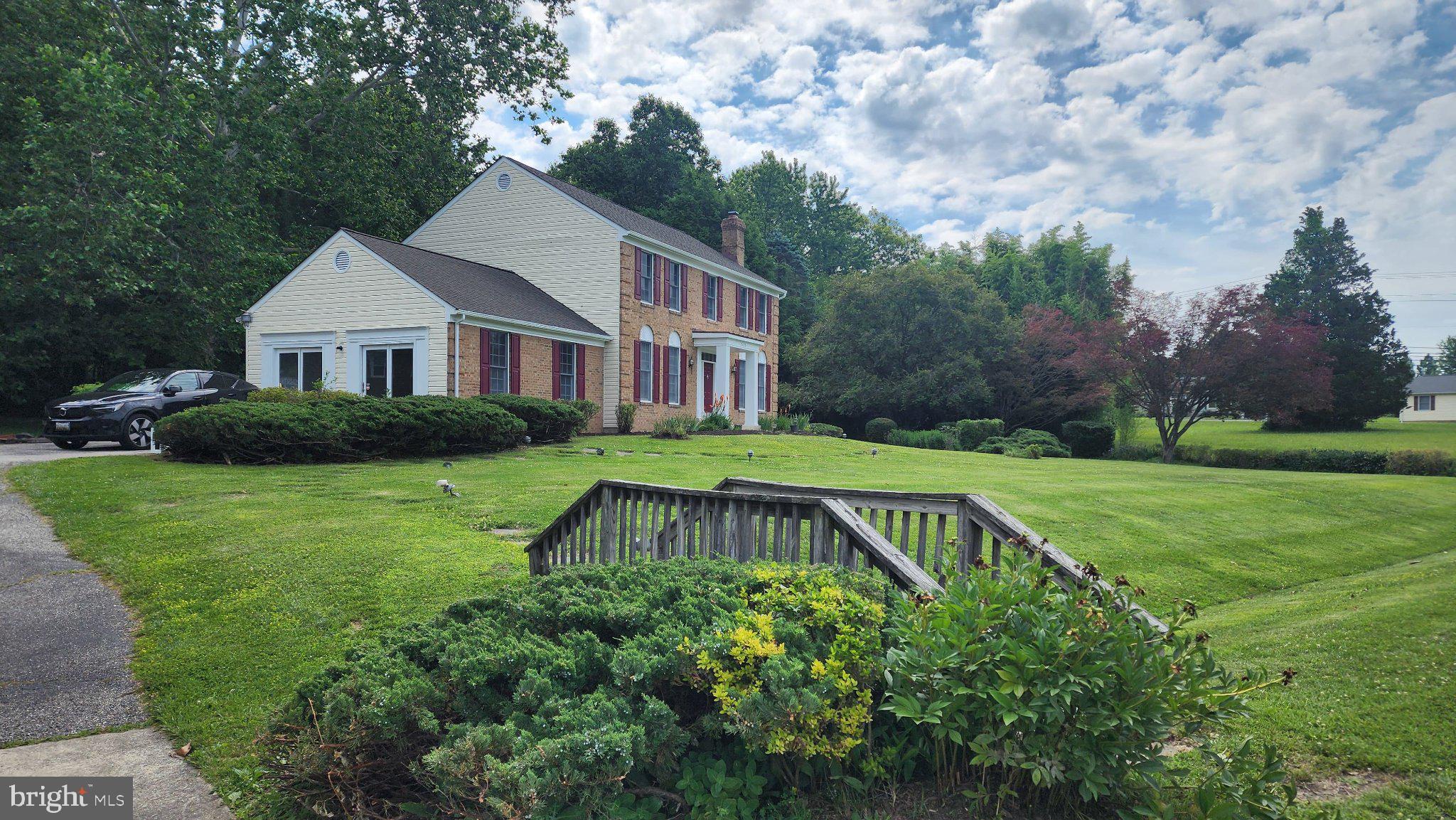 2625 McKenzie Road Ellicott City, MD 21042 - Photo 2 of 35 Charming home with lush green surroundings.