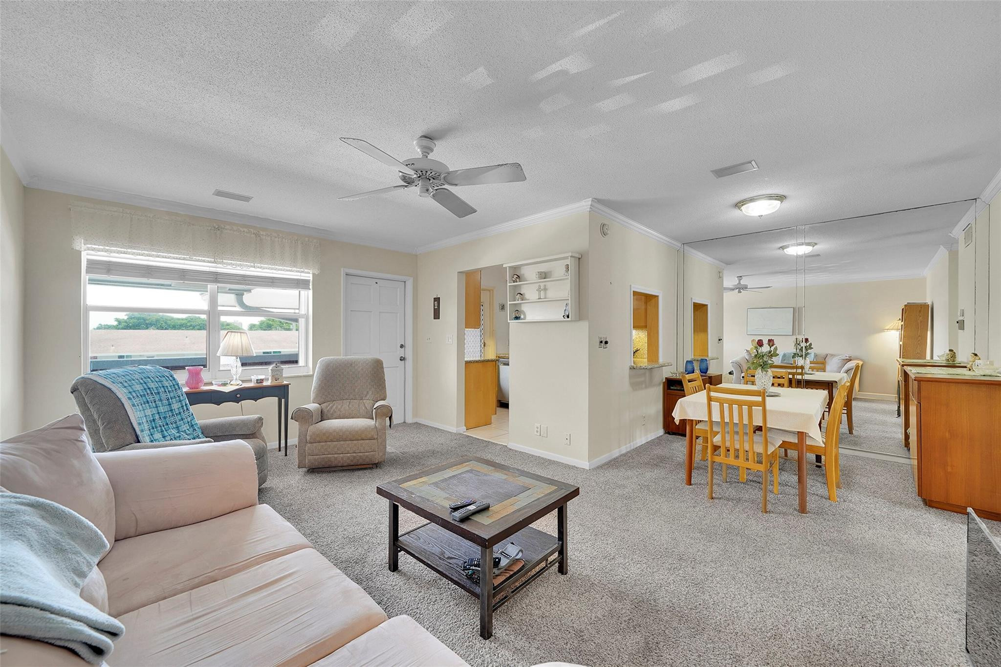 2050 Northeast 39th Street, Unit E306 Lighthouse Point, FL 33064 - Photo 8 of 25 Living Room & Dining Area