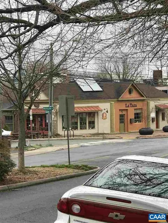 a close view of a door and wooden floor