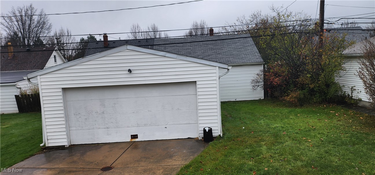 4161 Lambert Road Cleveland, OH 44121 - Photo 16 of 18 Garage with a lawn