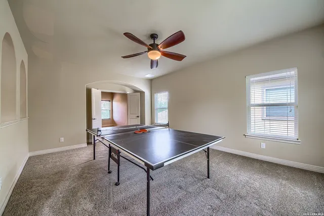 a workspace with furniture and window