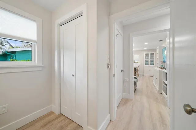 a view of a bathroom from a hallway