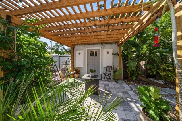 a view of yard with patio