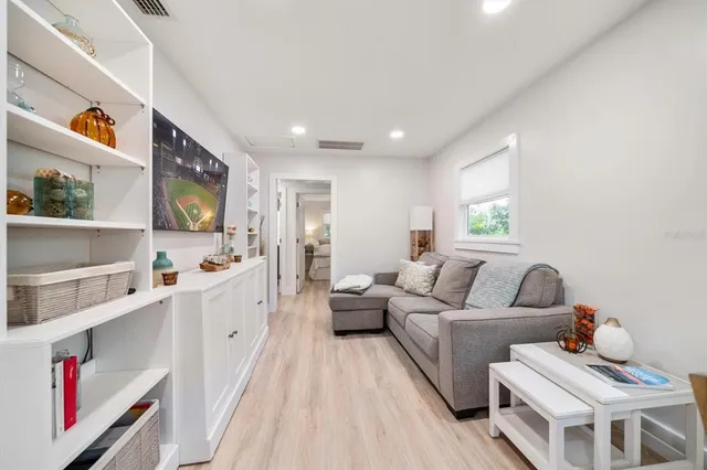 a living room with furniture and a couch