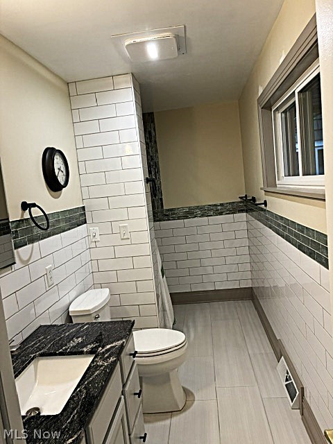 303 Somerset Road Akron, OH 44313 - Photo 16 of 29 The master bath is updated with a shower enclosure.