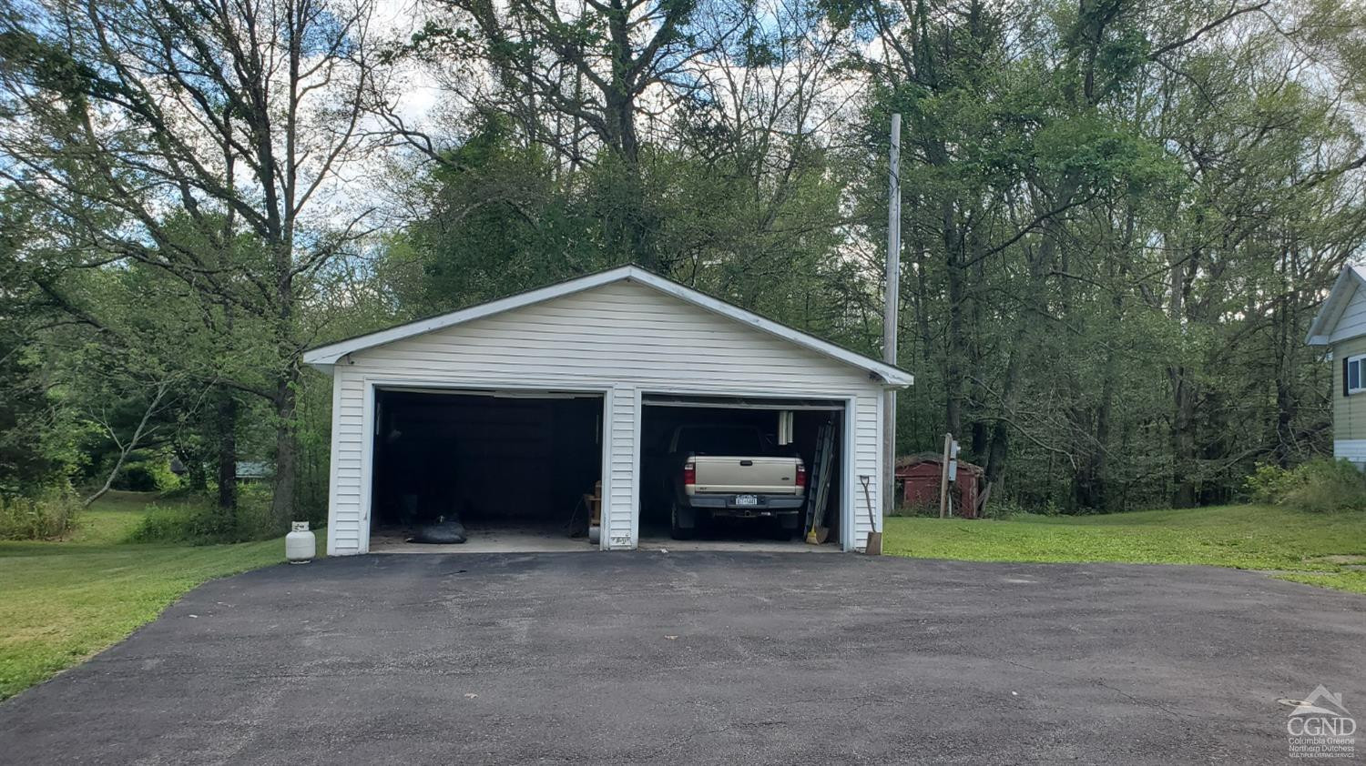 17 Vernal Butler Road Purling, NY 12470 - Photo 4 of 8 a view of a house with a yard and large trees
