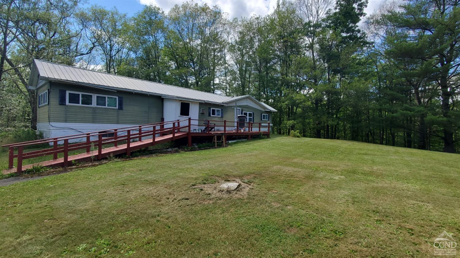 17 Vernal Butler Road Purling, NY 12470 - Photo 6 of 8 a view of a house with a backyard and a patio