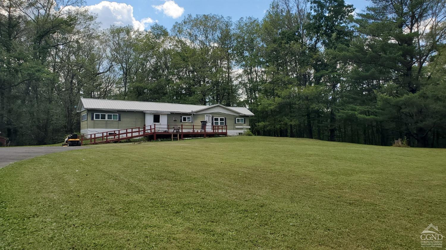 17 Vernal Butler Road Purling, NY 12470 - Photo 8 of 8 a front view of a house with yard and green space