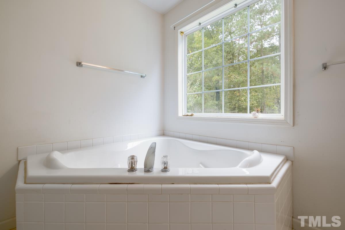 200 Landmark Road Willow Spring, NC 27592 - Photo 11 of 25 a close view of a bathtub in a bathroom