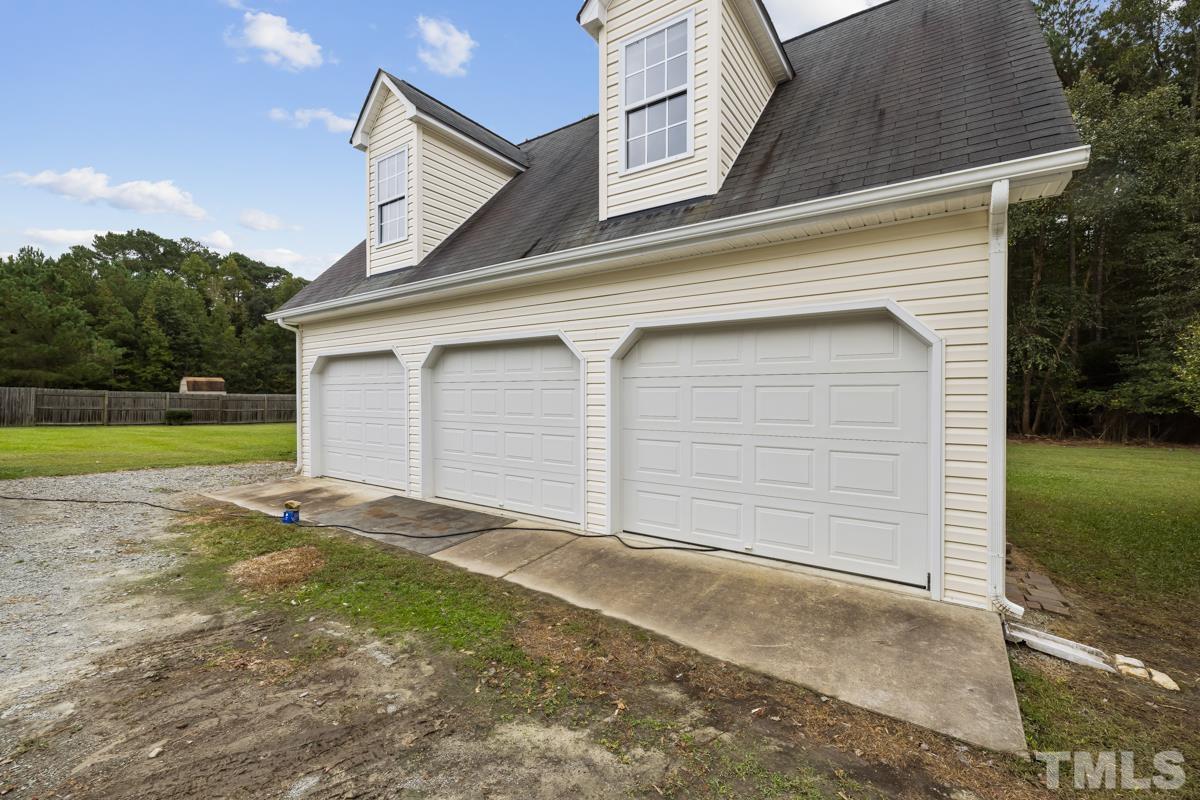 200 Landmark Road Willow Spring, NC 27592 - Photo 25 of 25 a view of a house with a backyard