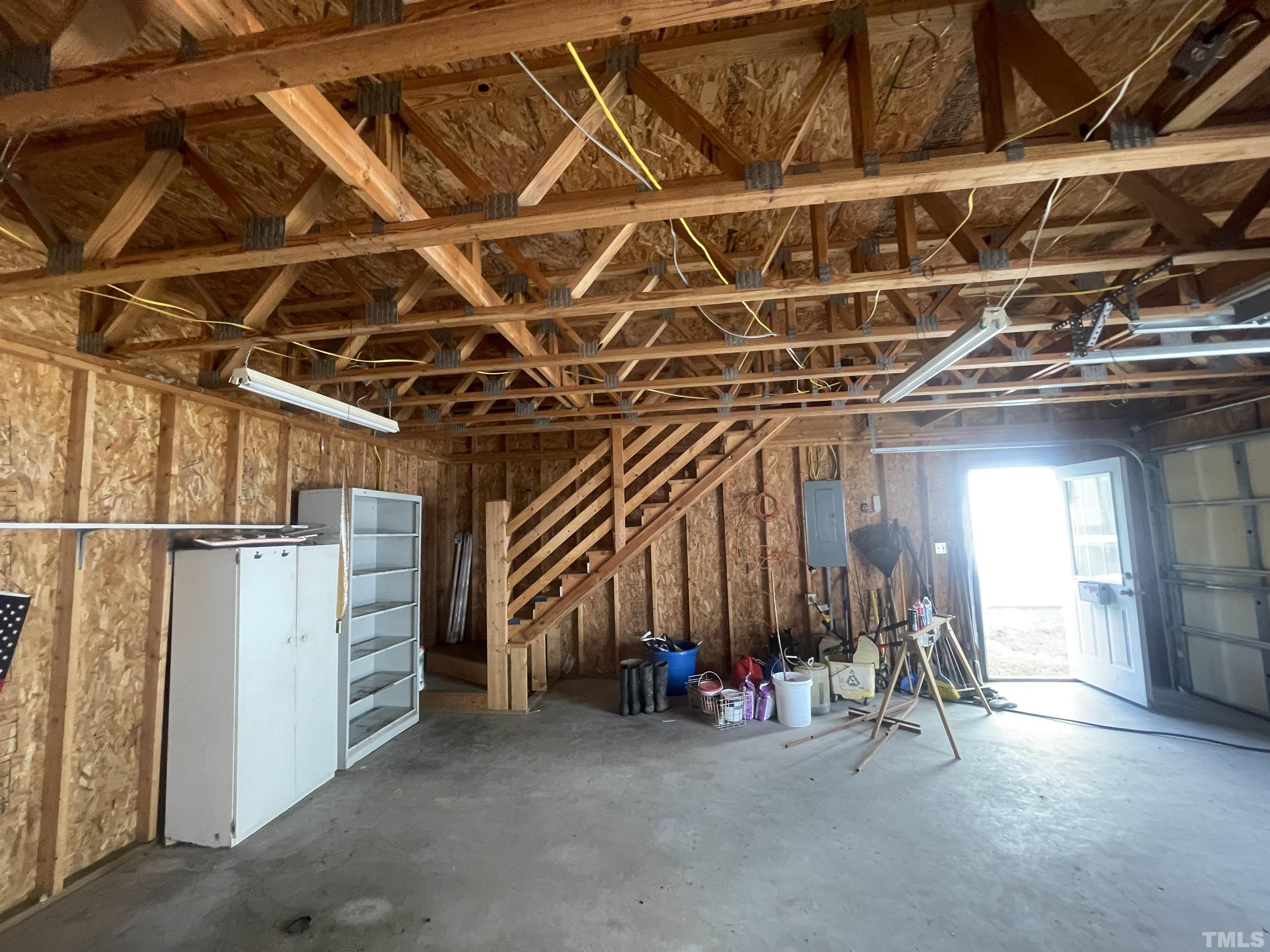 200 Landmark Road Willow Spring, NC 27592 - Photo 8 of 25 a view of a room with wooden walls