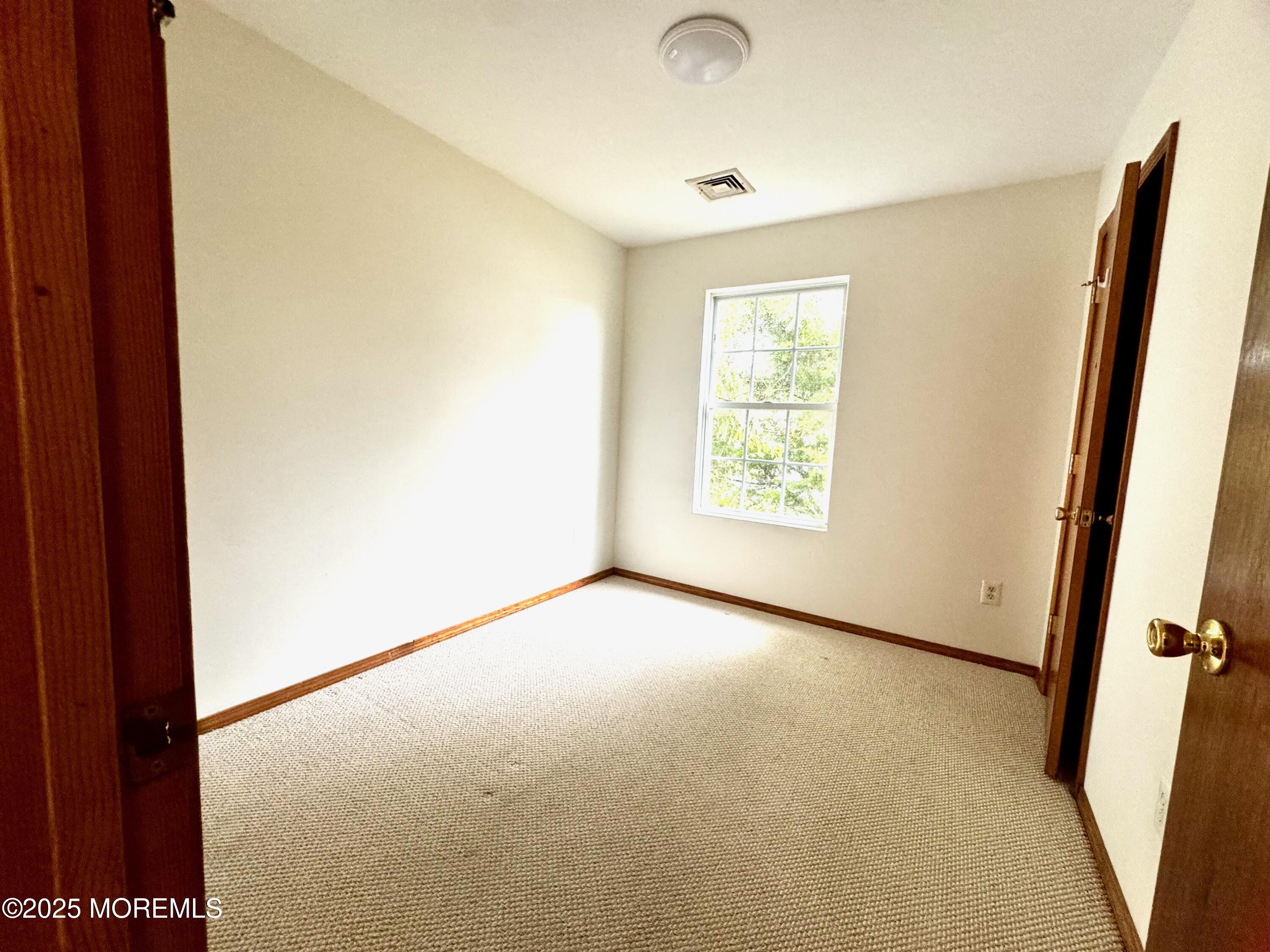244 Raritan Street Keyport, NJ 07735 - Photo 13 of 18 an empty room with windows