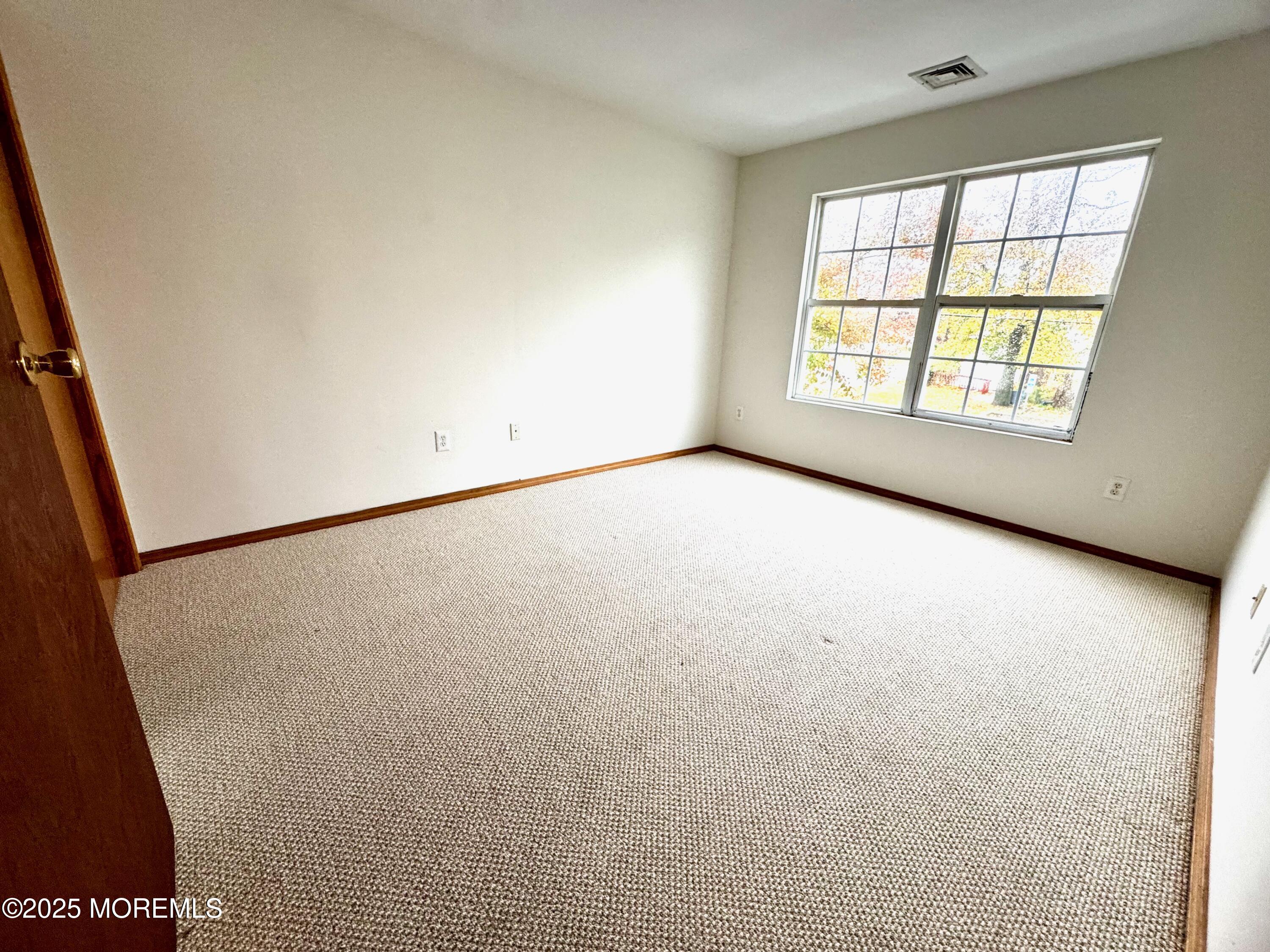 244 Raritan Street Keyport, NJ 07735 - Photo 15 of 18 an empty room with windows