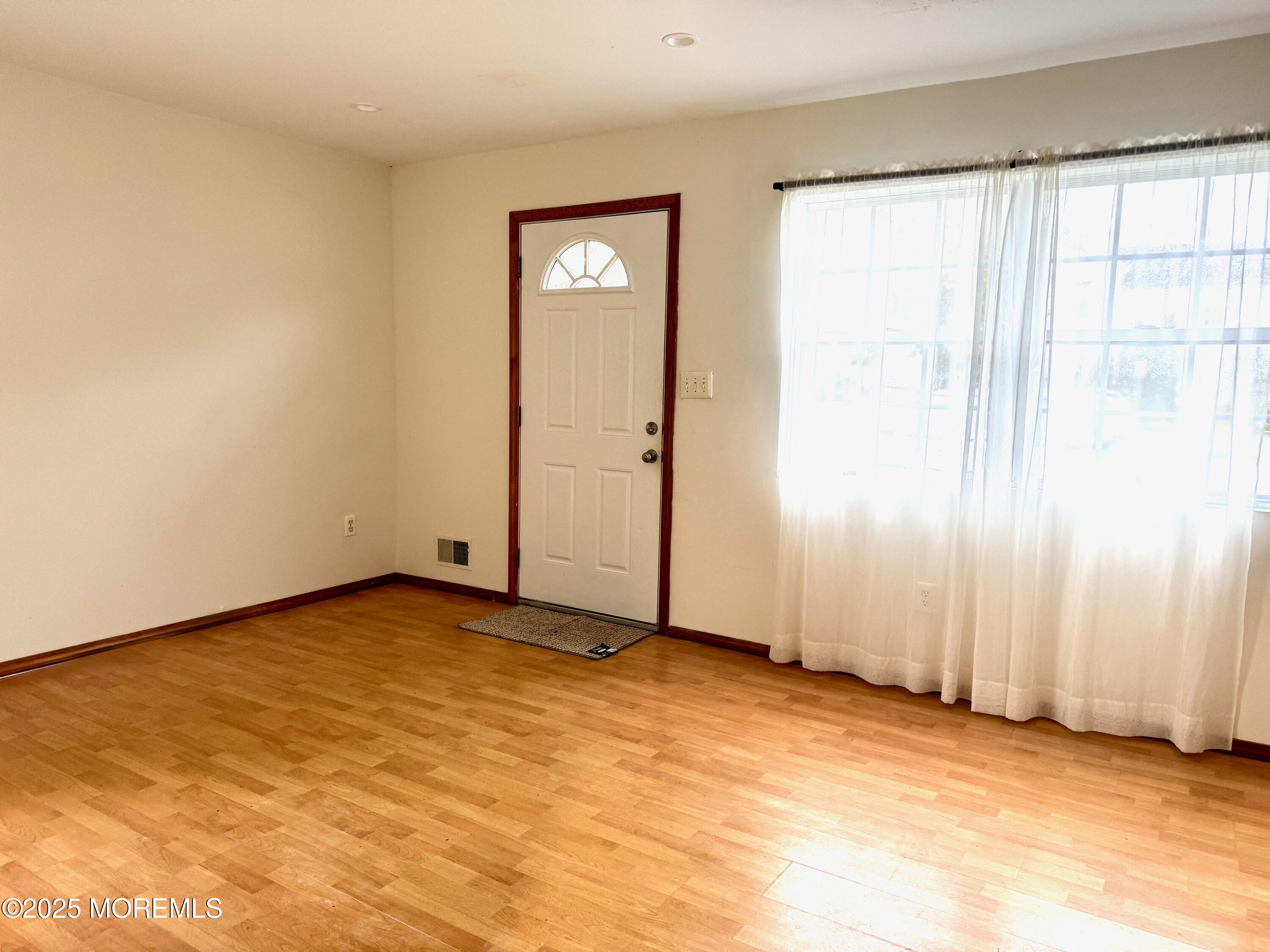 244 Raritan Street Keyport, NJ 07735 - Photo 6 of 18 a view of an empty room with window