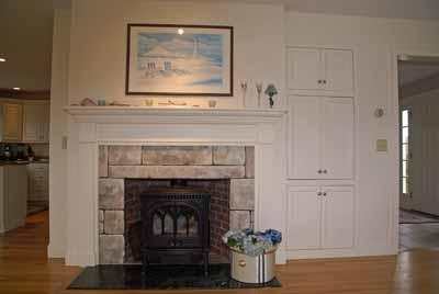 326 Morris Island Road Chatham, MA 02633 - Photo 13 of 34 a living room with furniture and a fireplace