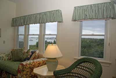 326 Morris Island Road Chatham, MA 02633 - Photo 15 of 34 a living room with furniture a lamp and a potted plant