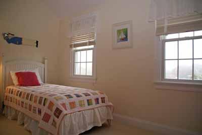 326 Morris Island Road Chatham, MA 02633 - Photo 22 of 34 a bedroom with a bed and window