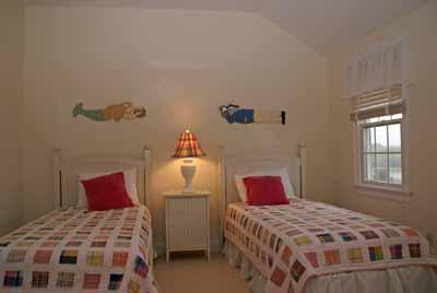 326 Morris Island Road Chatham, MA 02633 - Photo 23 of 34 a bedroom with a bed and window