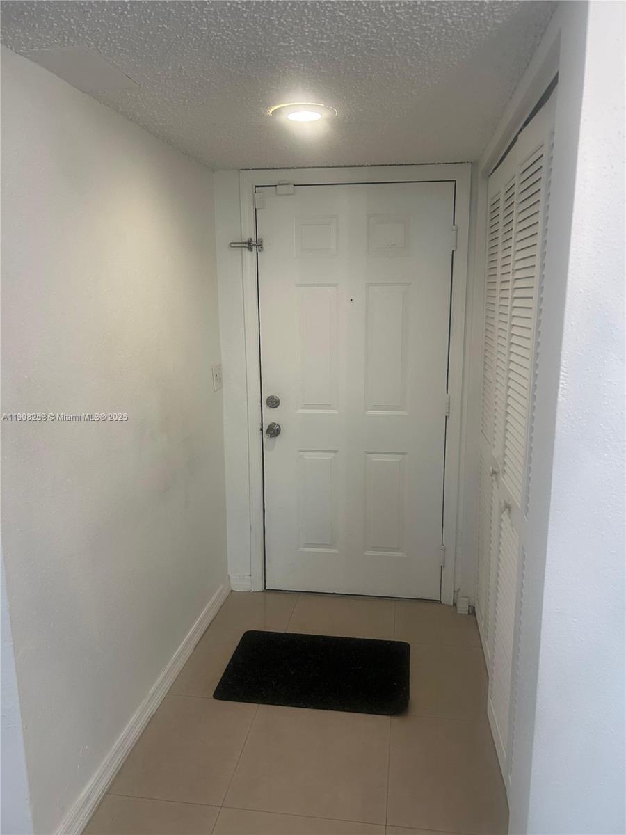 3995 West McNab Road, Unit B310 Pompano Beach, FL 33069 - Photo 7 of 10 a bathroom with a shower