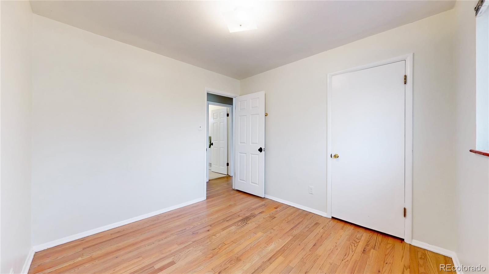 3246 South Stuart Street Denver, CO 80236 - Photo 16 of 43 a view of an empty room