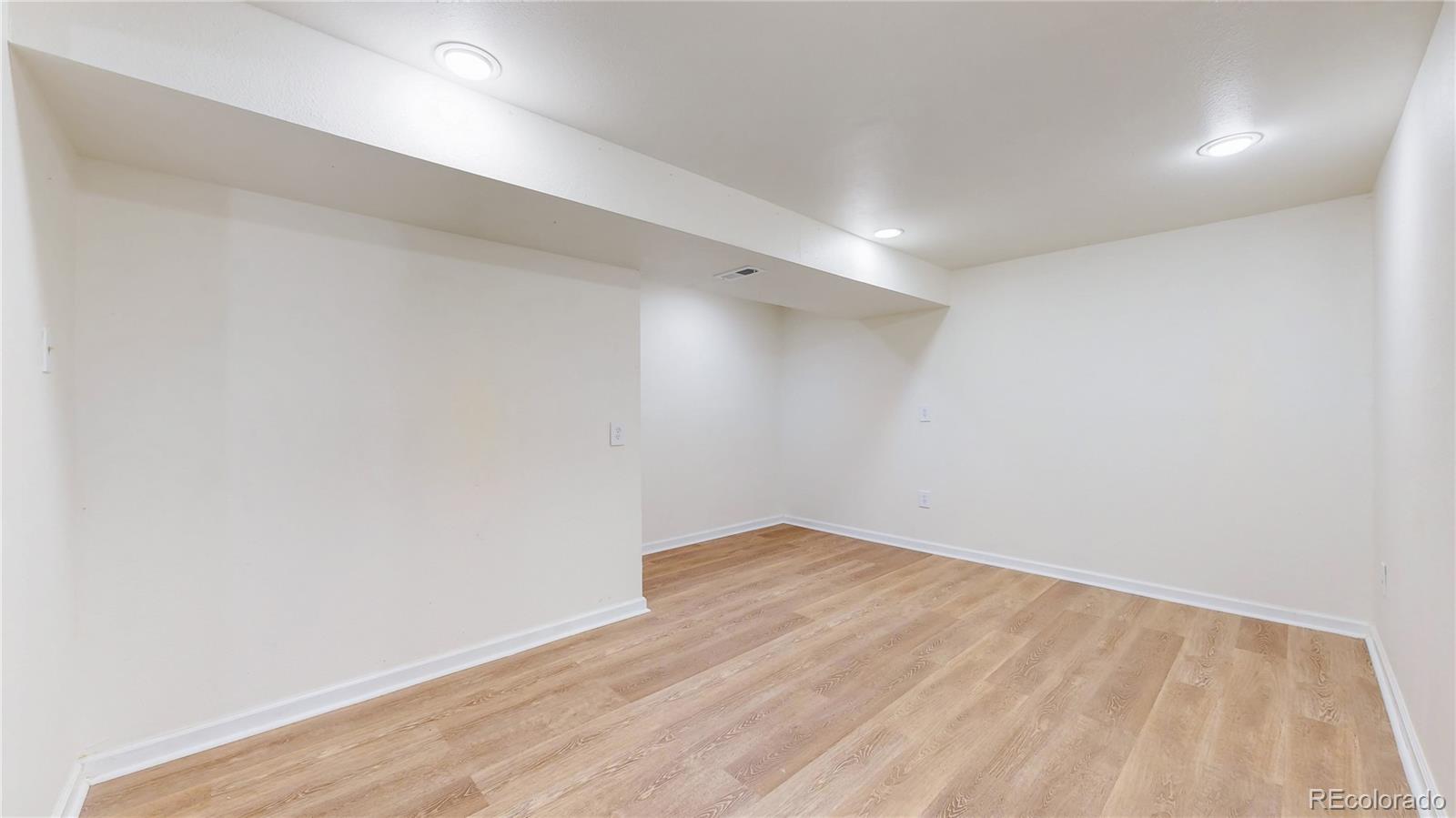 3246 South Stuart Street Denver, CO 80236 - Photo 32 of 43 a view of an empty room