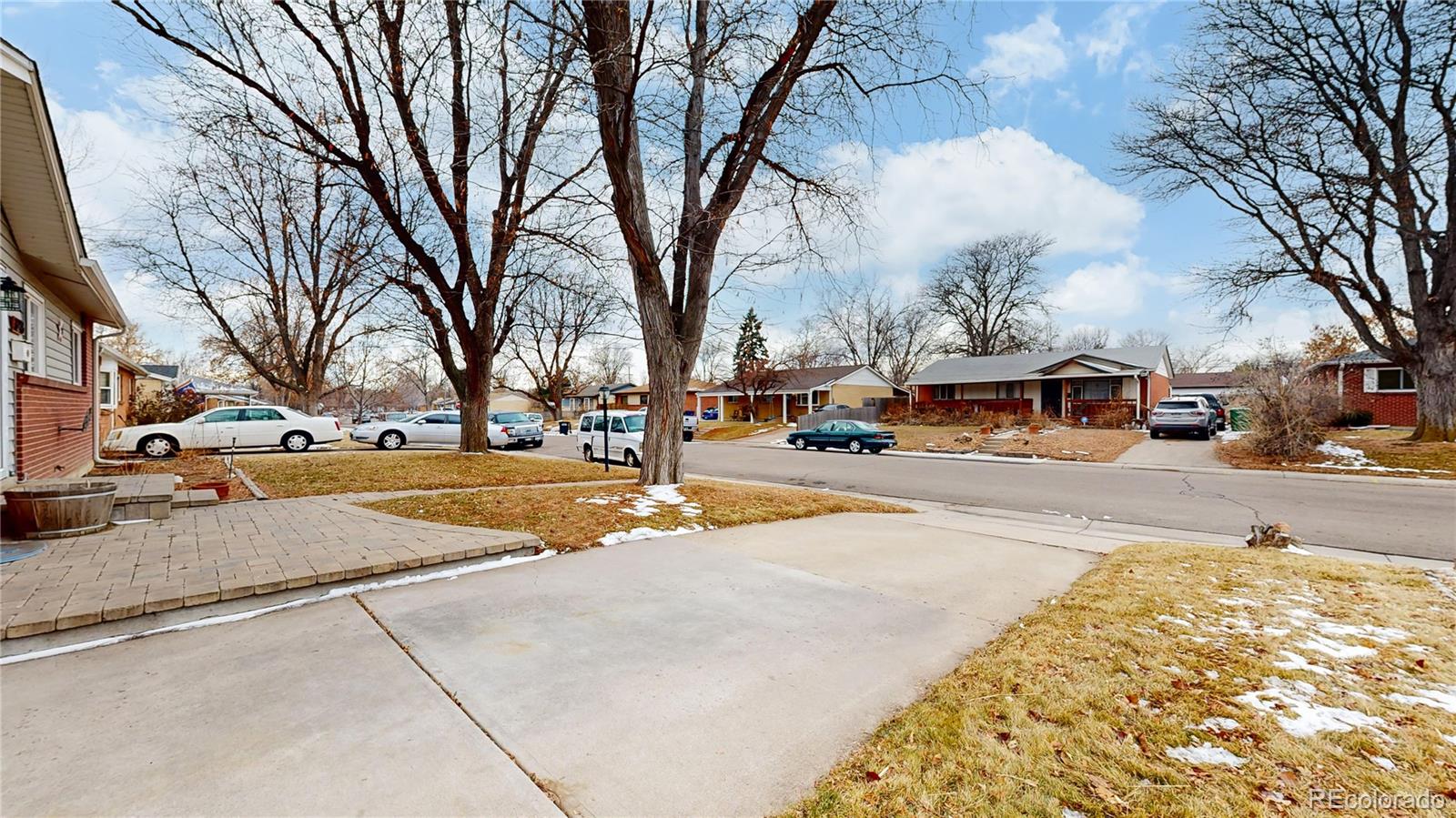 3246 South Stuart Street Denver, CO 80236 - Photo 37 of 43 a view of street with cars