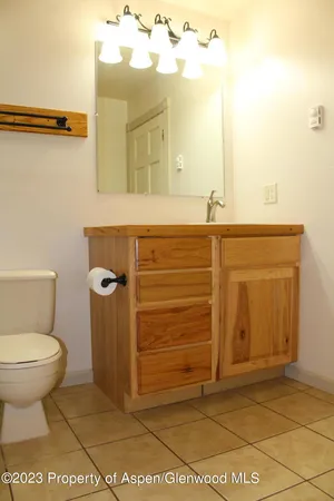 a bathroom with a sink and a toilet