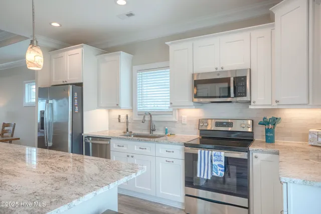 $1,250,000 | 876 Villas Drive, North Topsail Beach, NC 28460