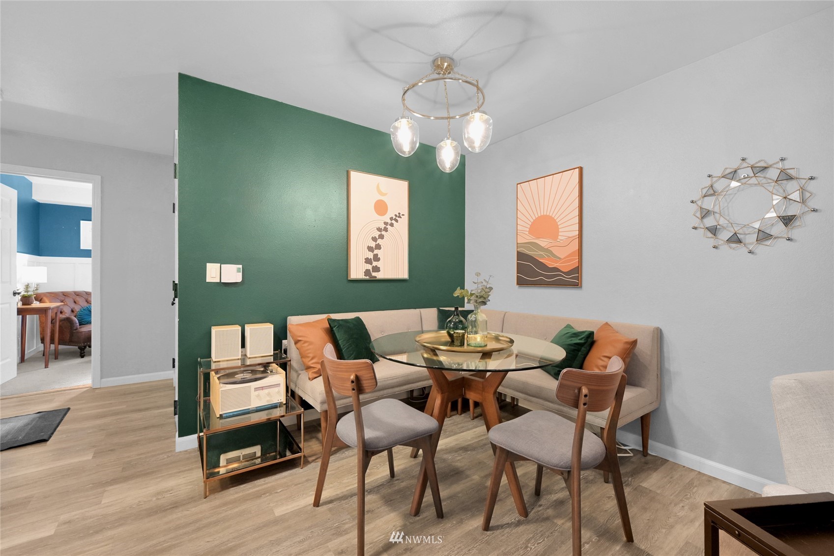 2201 192nd Street Southeast, Unit R103 Bothell, WA 98012 - Photo 12 of 29 a view of a dining room with furniture and wooden floor