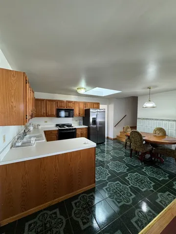 a large room with lots of counter top space