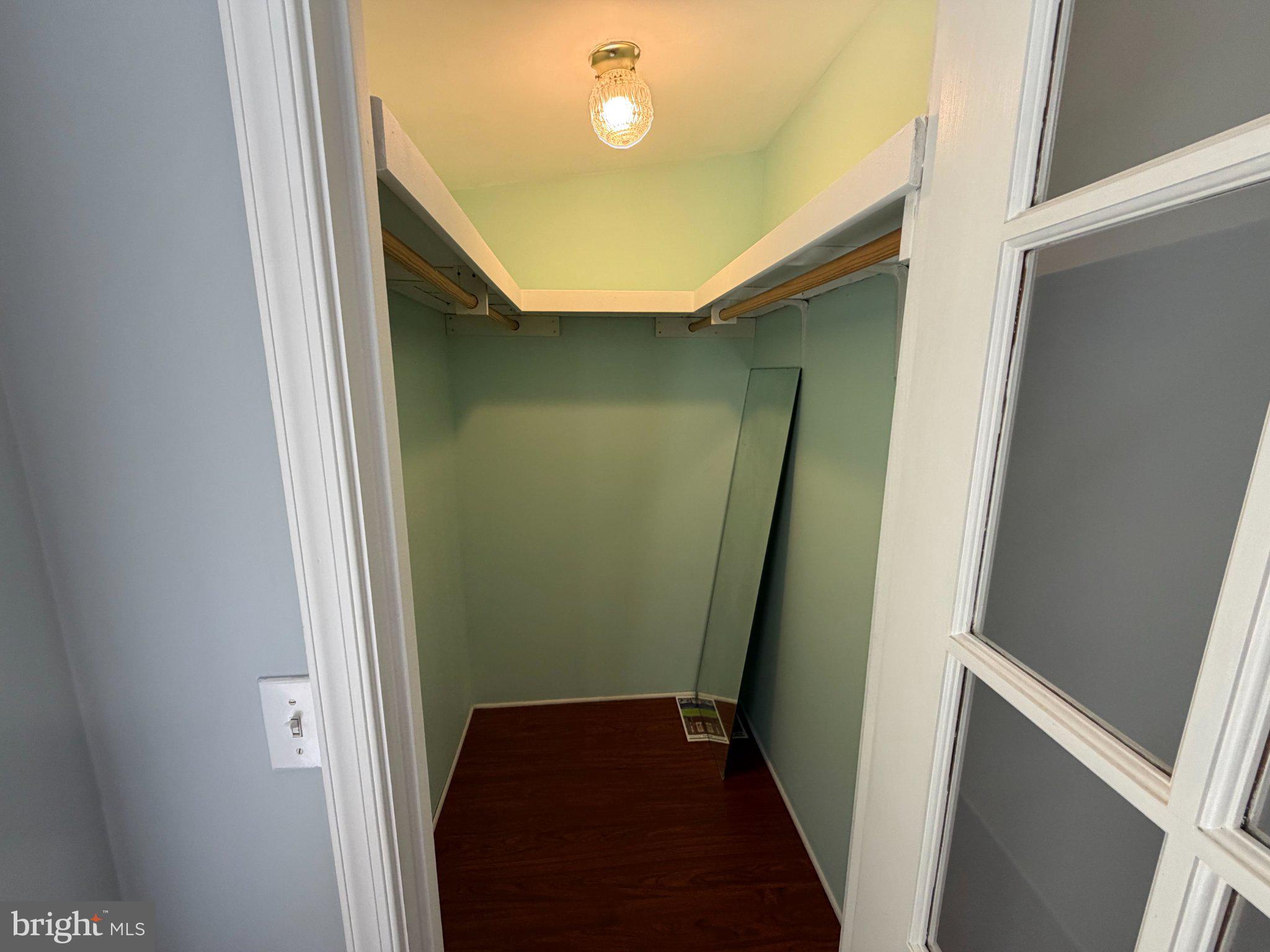 7923 Stork Road Alexandria, VA 22306 - Photo 8 of 17 Spacious closet with modern charm.