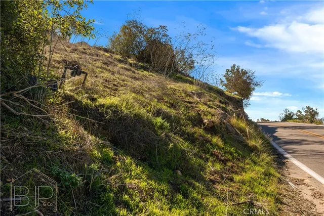 an aerial view of residential house with parking space