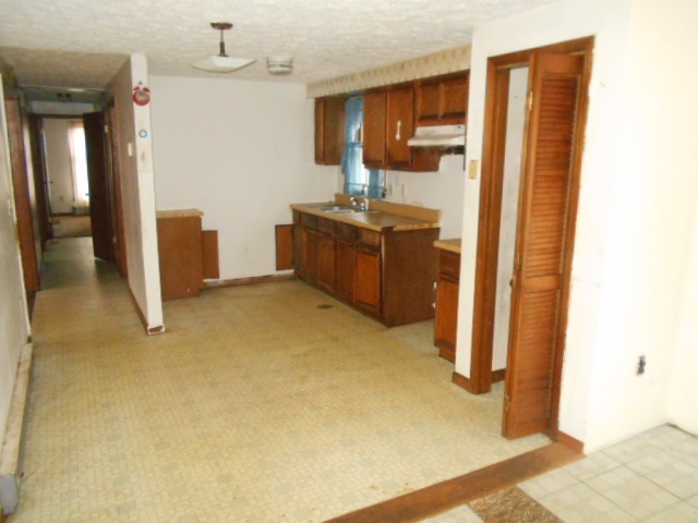 165 Village Road Shipman, VA 22971 - Photo 4 of 18 a bathroom with a sink a mirror and shower