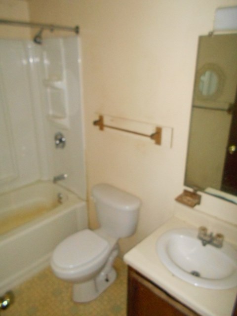 165 Village Road Shipman, VA 22971 - Photo 6 of 18 a bathroom with a sink toilet and shower