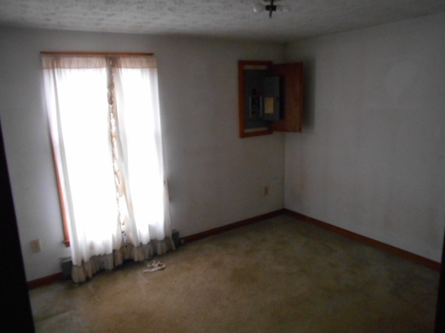 165 Village Road Shipman, VA 22971 - Photo 9 of 18 an empty room with a window