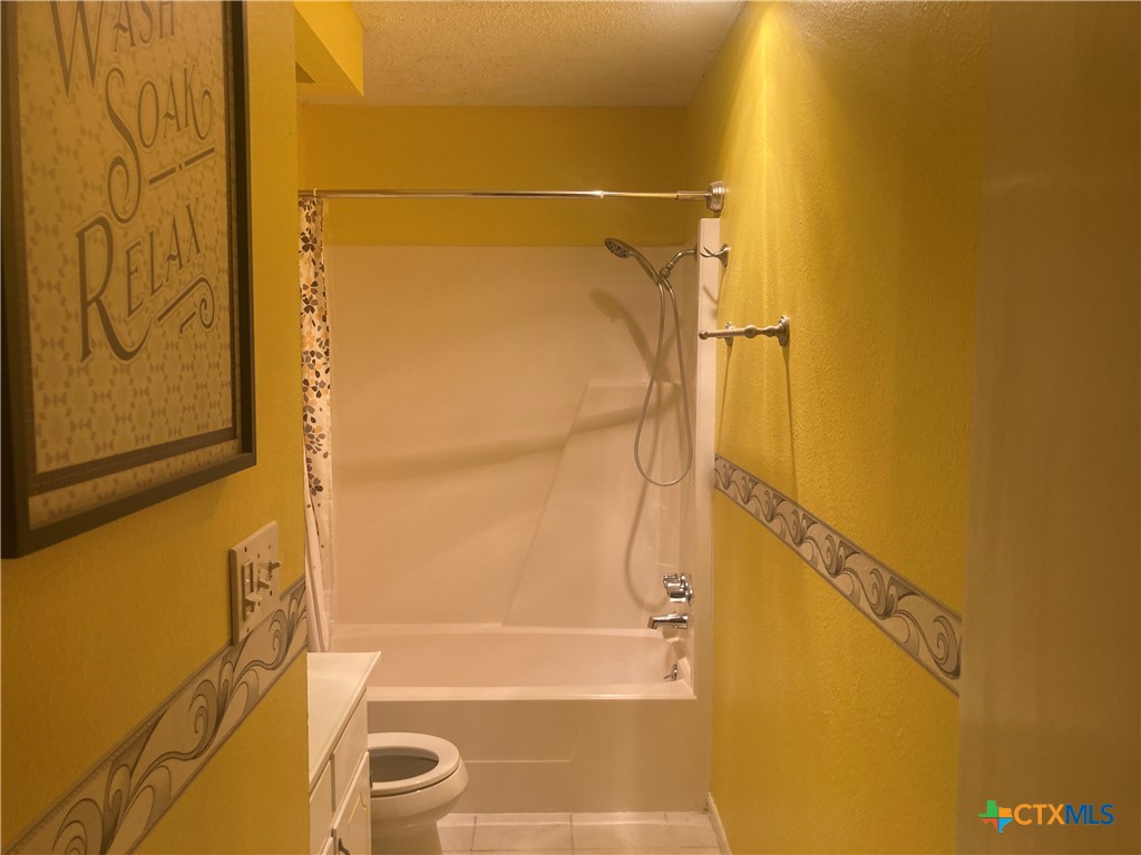 406 Rattan Drive Victoria, TX 77901 - Photo 7 of 15 a bathroom with a shower