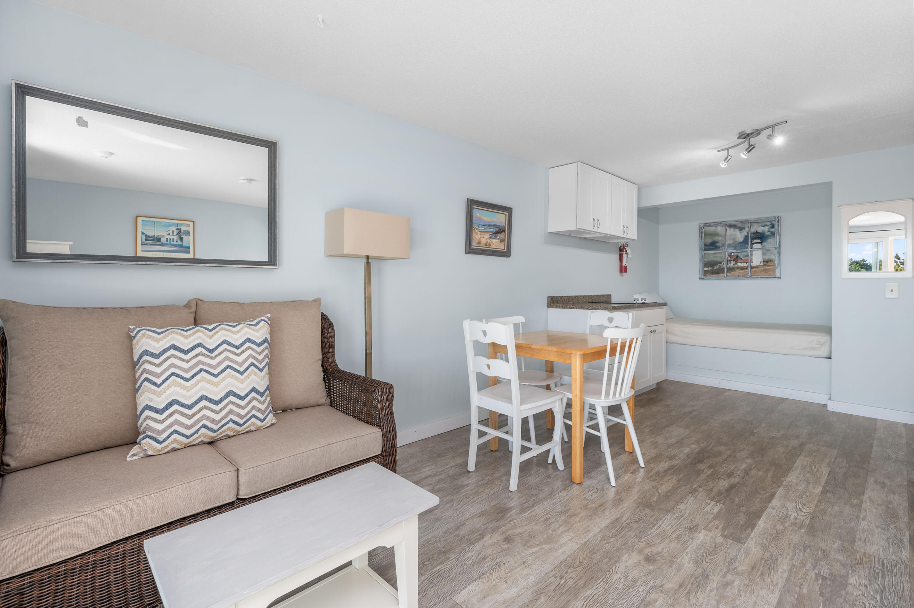 132 Shore Road, Unit 7 Truro, MA 02666 - Photo 10 of 24 a view of a dining room with furniture and wooden floor