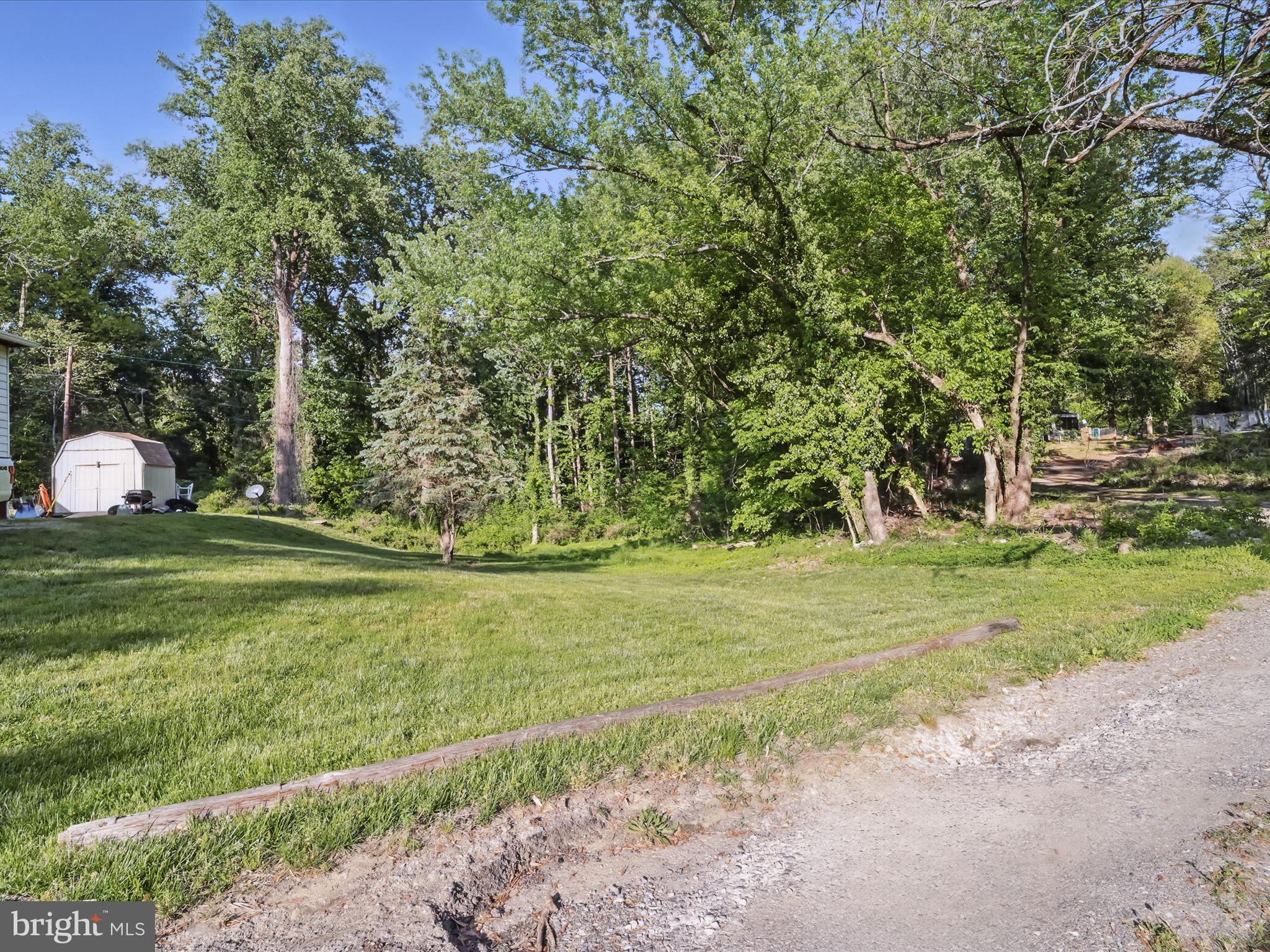 5625 Oakford Road Capitol Heights, MD 20743 - Photo 6 of 10 a view of a field with large trees