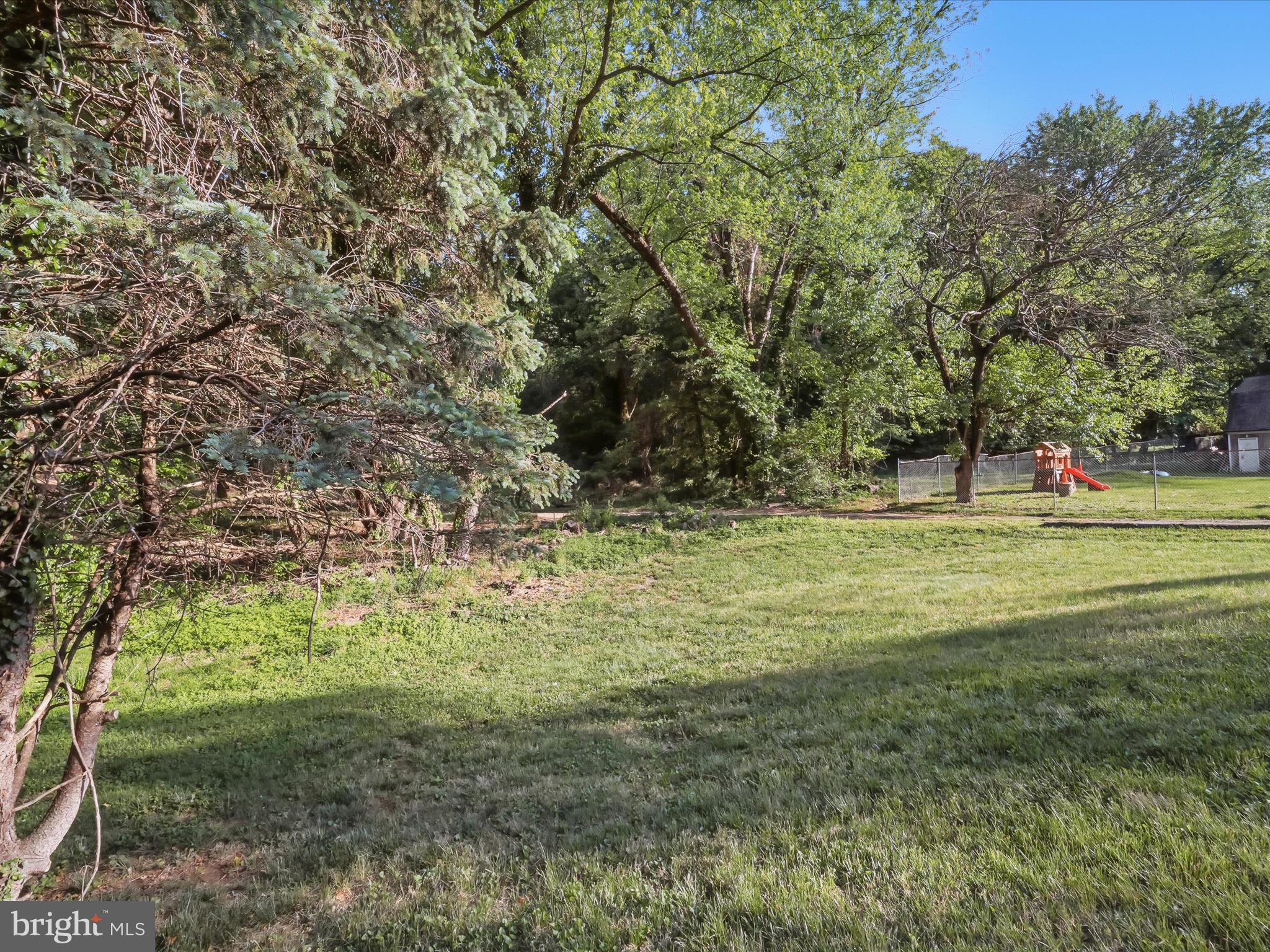 5625 Oakford Road Capitol Heights, MD 20743 - Photo 9 of 10 a view of outdoor space with trees all around