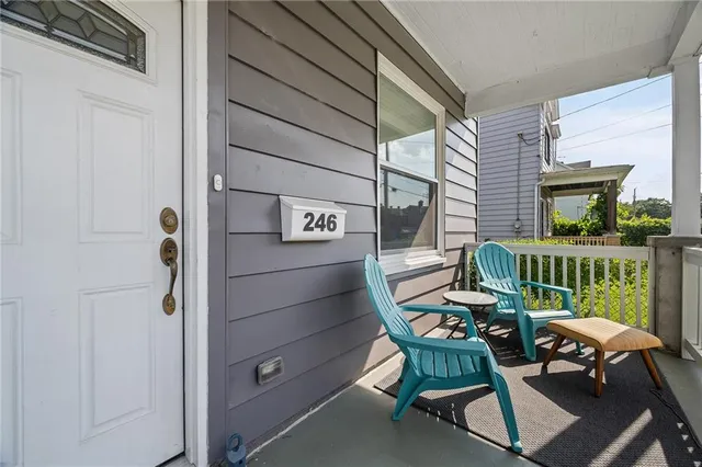a balcony with furniture and a window