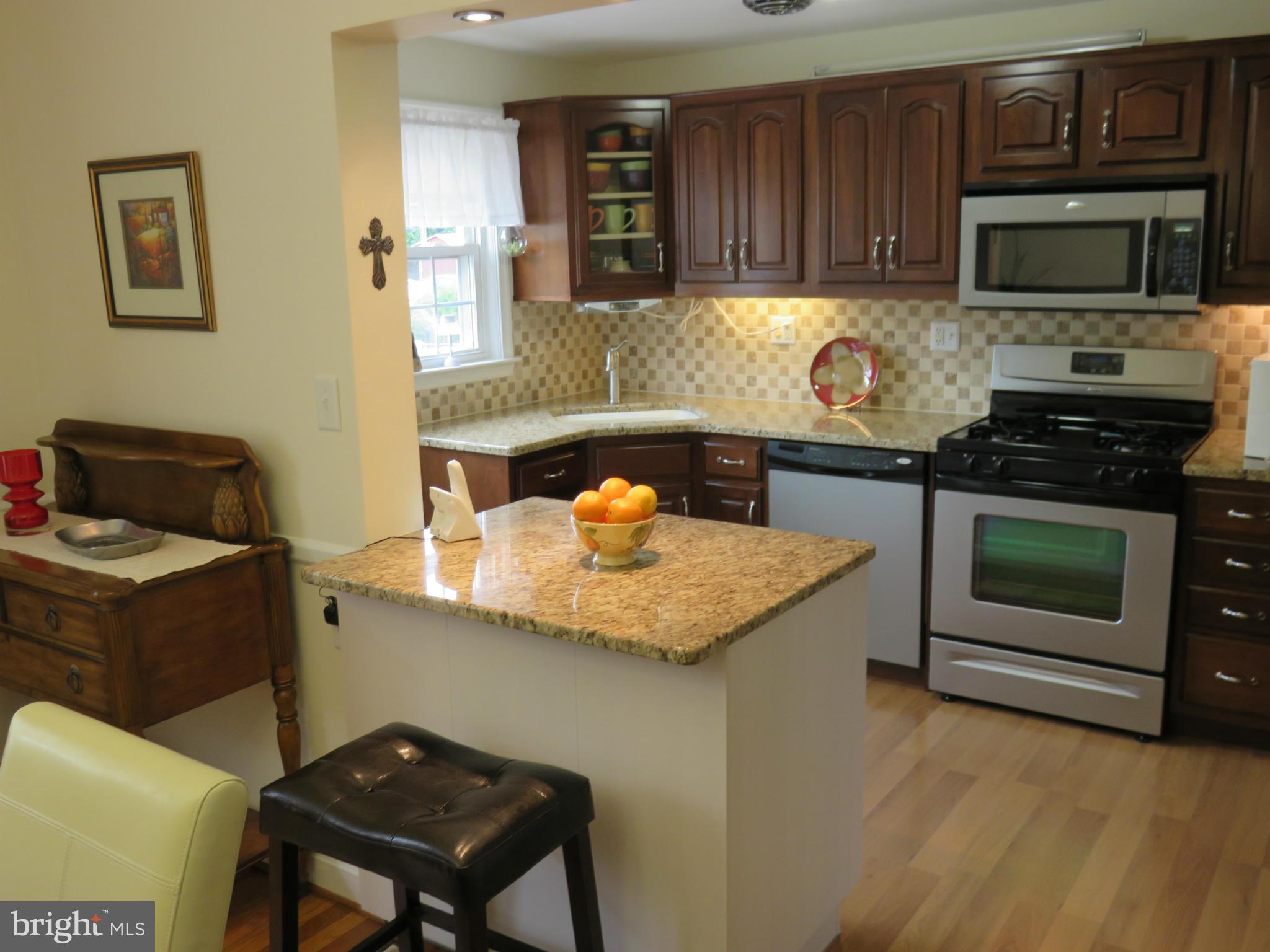 8102 Pleasant Plains Road Baltimore, MD 21286 - Photo 11 of 30 Kitchen open to DR