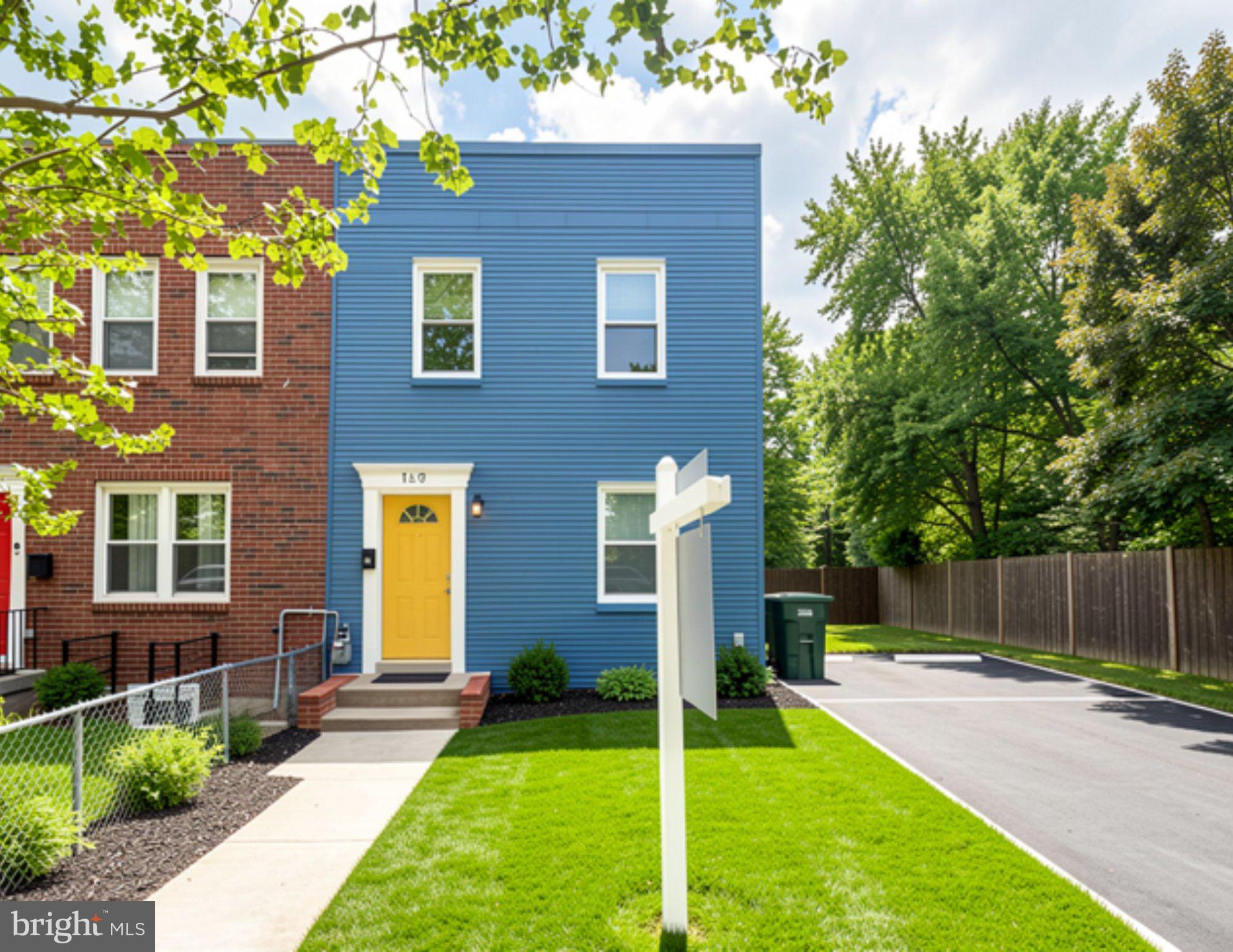 19 Atlantic Street Southeast Washington, DC 20032 - Photo 2 of 35 Charming blue home with vibrant door.