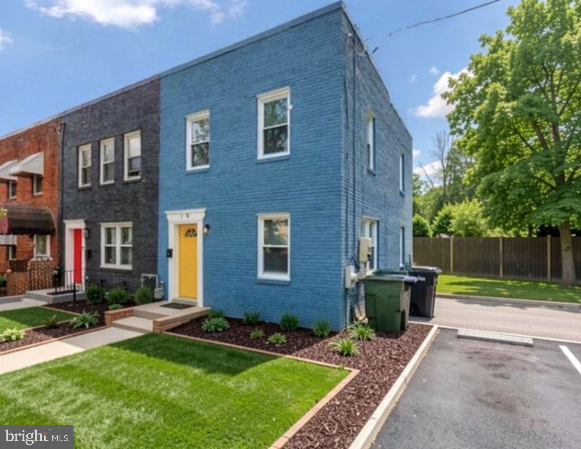 19 Atlantic Street Southeast Washington, DC 20032 - Photo 3 of 35 Charming blue duplex with lush greenery.