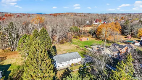 a view of a tree with an outdoor space