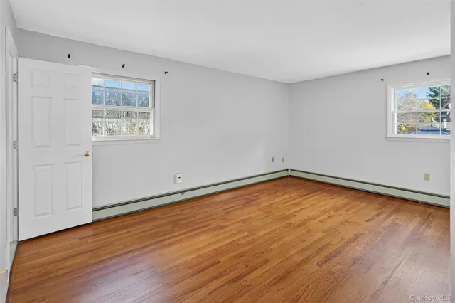 a bathroom with a sink a mirror and shower