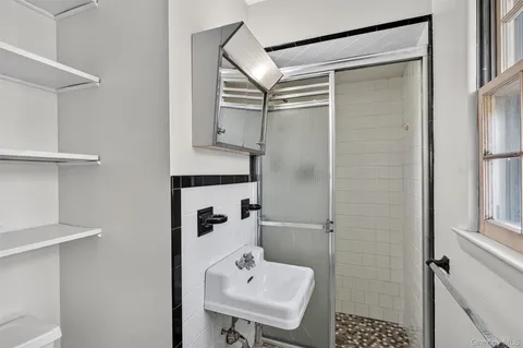 a view of an empty room with a window